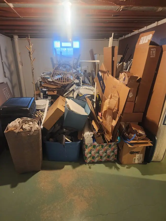 Roll-off dumpster container at job site for Yard Waste Dumpster Rental in Gamewell